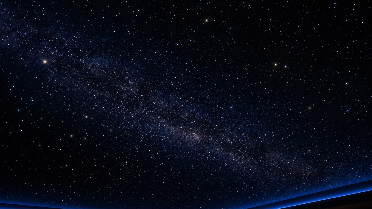 Close-up of a finished DIY fiber optic star ceiling showing bright and faint stars with a soft Milky Way band